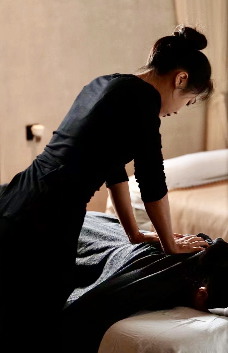Therapist performing a professional deep tissue massage